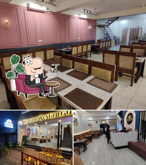 Take a seat at one of the tables at Siyaram family restaurant