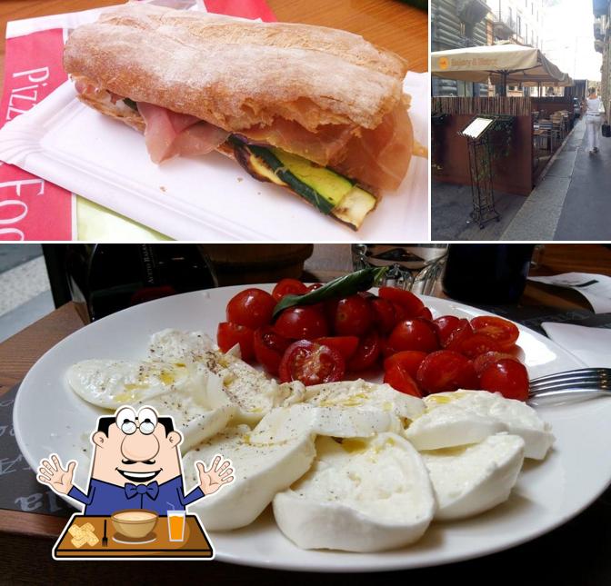 Questa è la immagine che mostra la cibo e interni di Patti