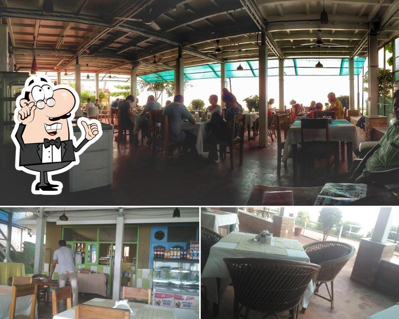 Take a seat at one of the tables at Cafe del Mar