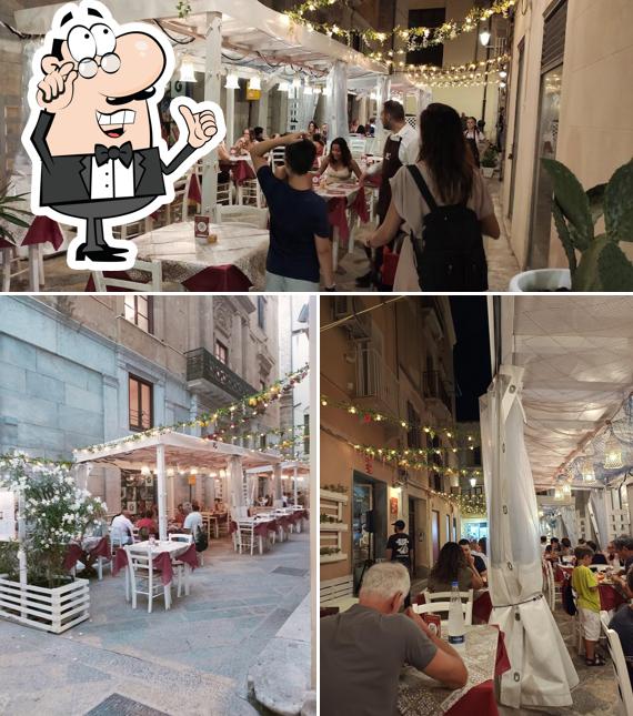Siediti a un tavolo di Hosteria Siciliana