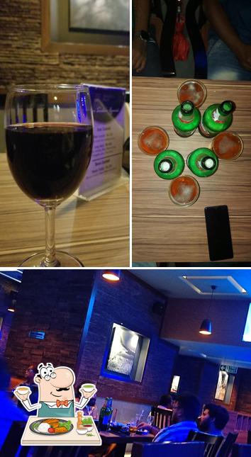 The picture of DREMUS Alco Lounge’s food and bar counter