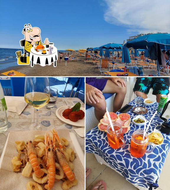 Guarda la immagine che mostra la cibo e interni di Lido da Gino