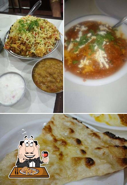 Pick pizza at Milan Punjab Restaurant