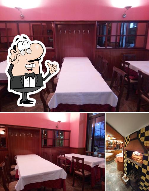 Dai un'occhiata agli interni di Pizzeria Lo Scugnizzo