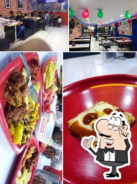The image of interior and food at Pizza Point Botad