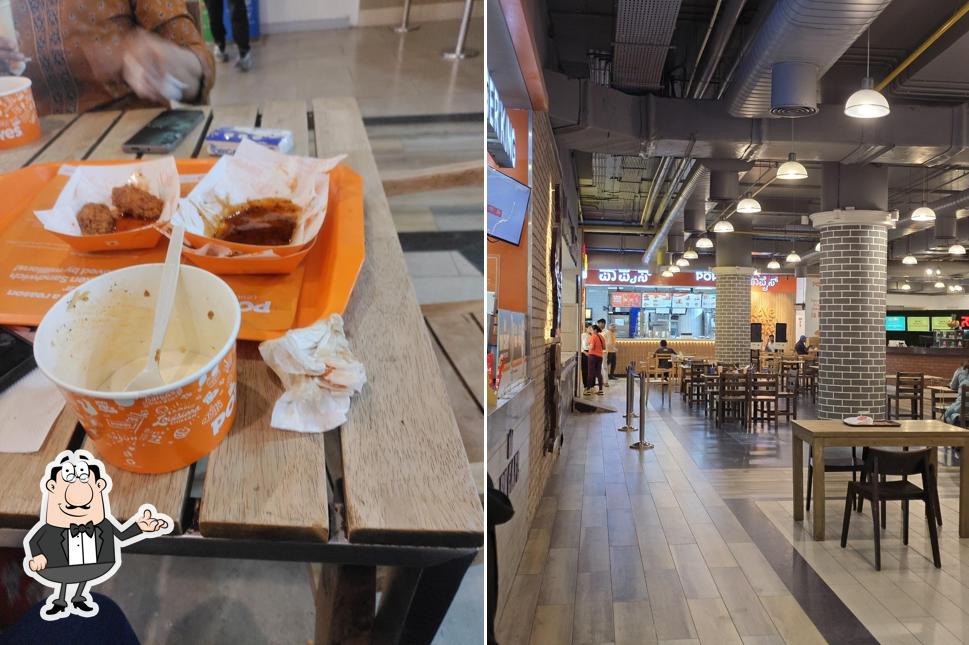 Take a seat at one of the tables at Popeyes - Famous Louisiana Chicken