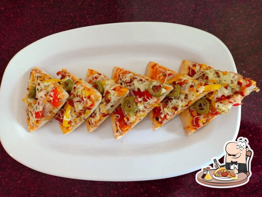At GRUB N GOSSIP, you can order pizza