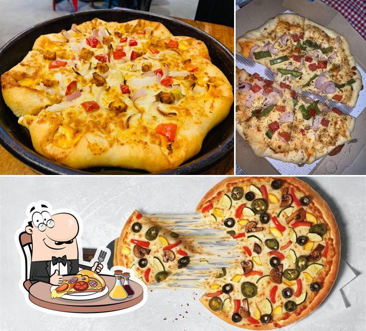 At Pizza Hut Tapovan Circle, Ahmedabad, you can enjoy pizza