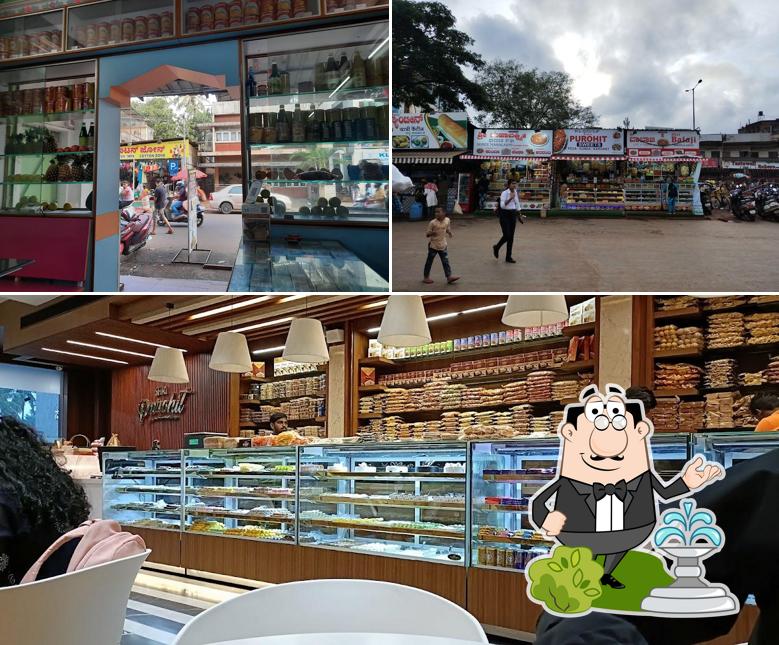 Take a look at the image showing exterior and interior at Suresh Purohit Sweets