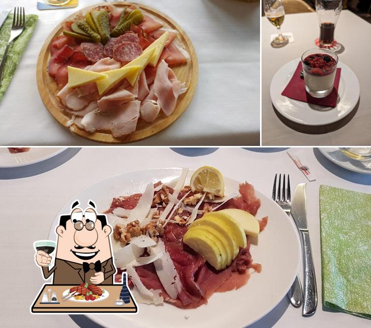 Prenditi i piatti di carne a El Calderon Ristorante Pizzeria