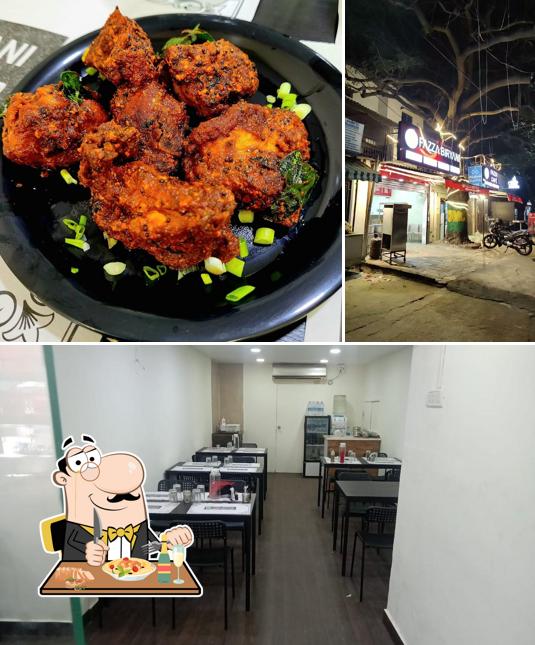 Among different things one can find food and interior at fazza biryani