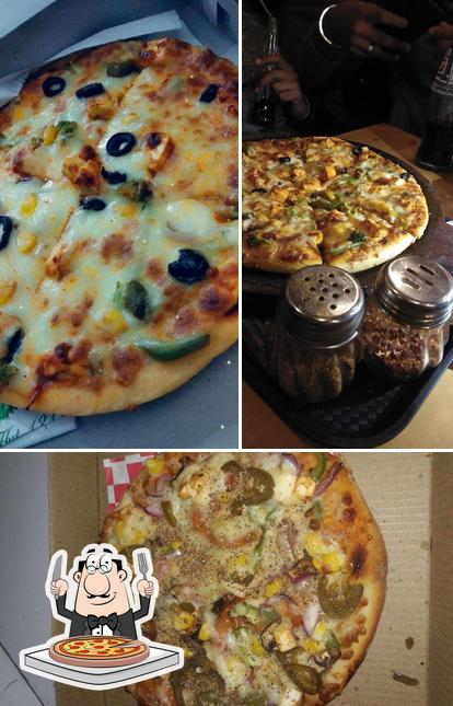 Try out pizza at Burger hut change to village oven