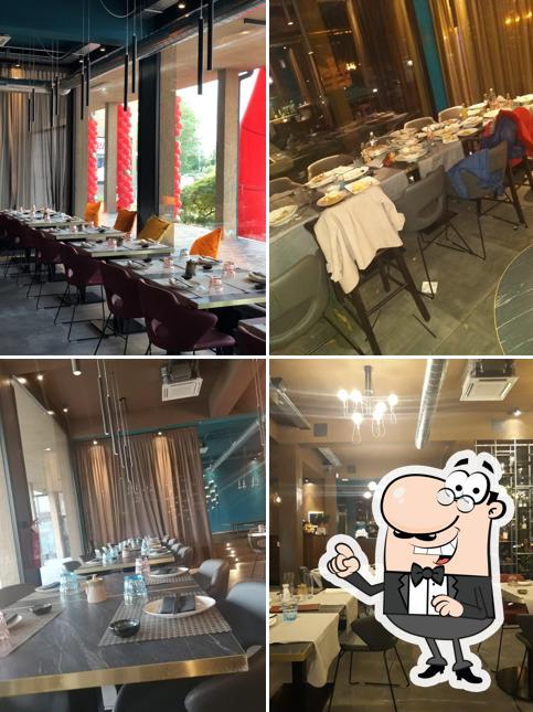 Dai un'occhiata agli interni di Zoy Sushi