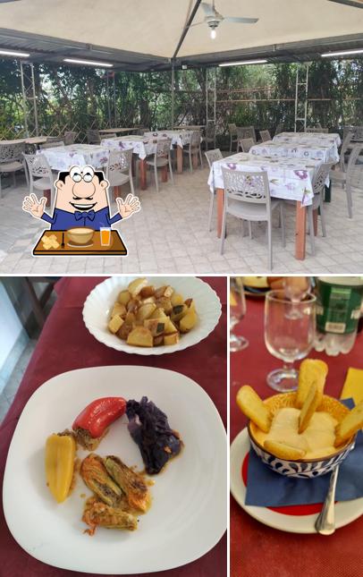Dai un’occhiata alla foto che presenta la cibo e interni di Bar Tabacchi Ristorante Candia