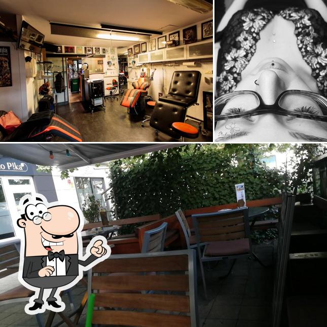 Siediti a un tavolo di Matija's piercing / Chebela Piercing Tattoo Caffe