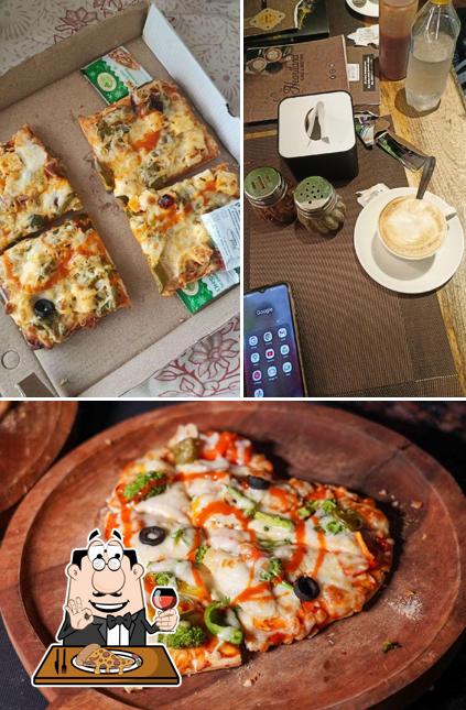 Get pizza at The Heartland cafe and Restro