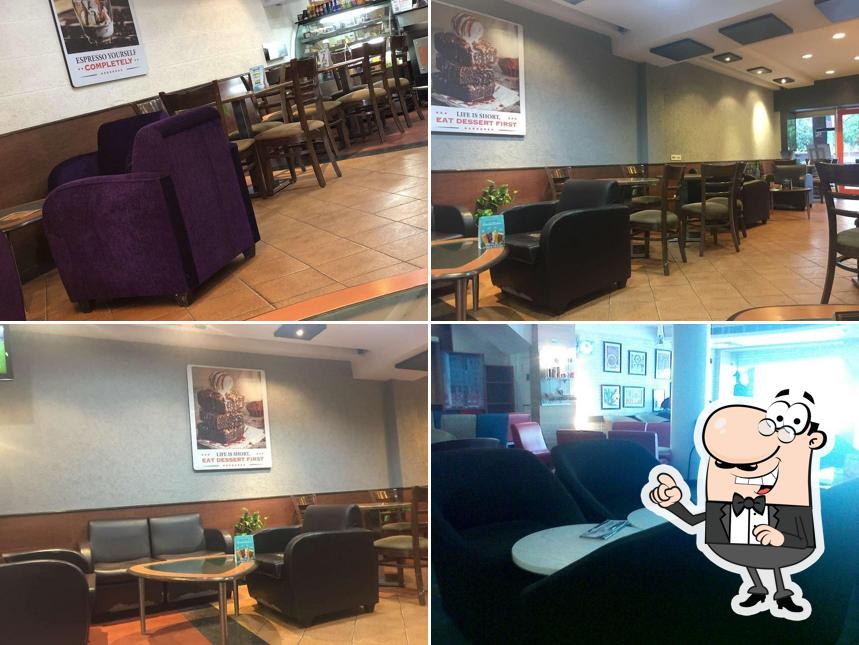 Take a seat at one of the tables at Barista