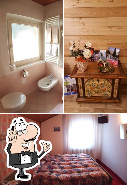 Gli interni di Albergo Garnì Edy, B&B e ristorante pizzeria. Alba di Canazei, Val di Fassa
