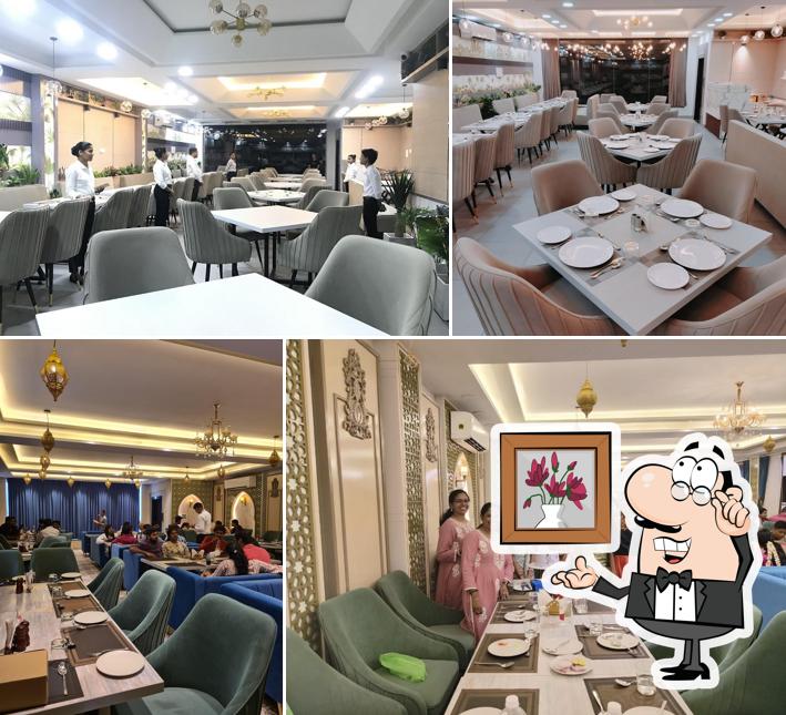 Take a seat at one of the tables at Hotel Abhiruchi Family Restaurant Nethaji Nagar Ballari