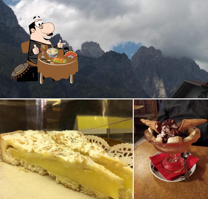 Dai un’occhiata alla foto che presenta la cibo e esterno di Meeting Bar