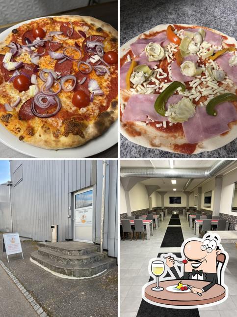 Questa è la immagine che presenta la cibo e interni di Pizza Uno