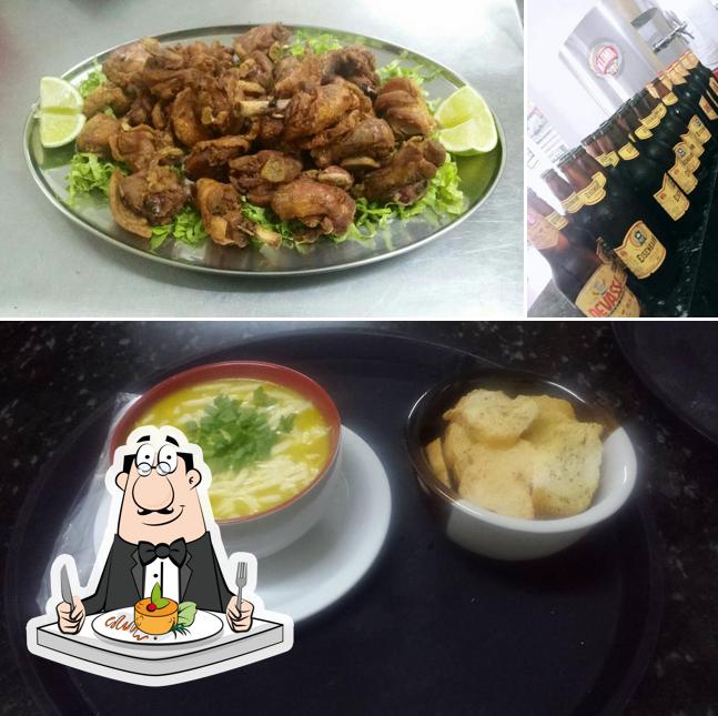 A foto da comida e cerveja no Cia Do Chopp