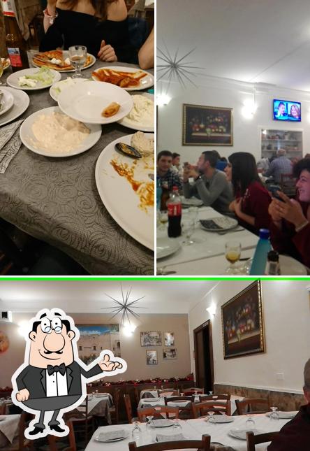 Questa è la immagine che mostra la interni e tavolo da pranzo di Fantasy - Ristorante Pizzeria