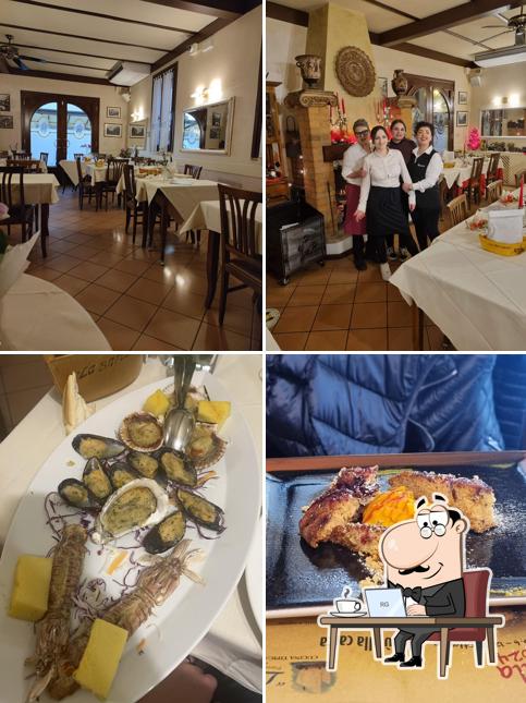 Siediti a un tavolo di Antica Trattoria La Barcaccia