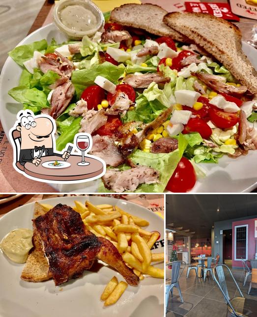 Questa è la immagine che presenta la cibo e interni di Befed Brew Pub Correggio