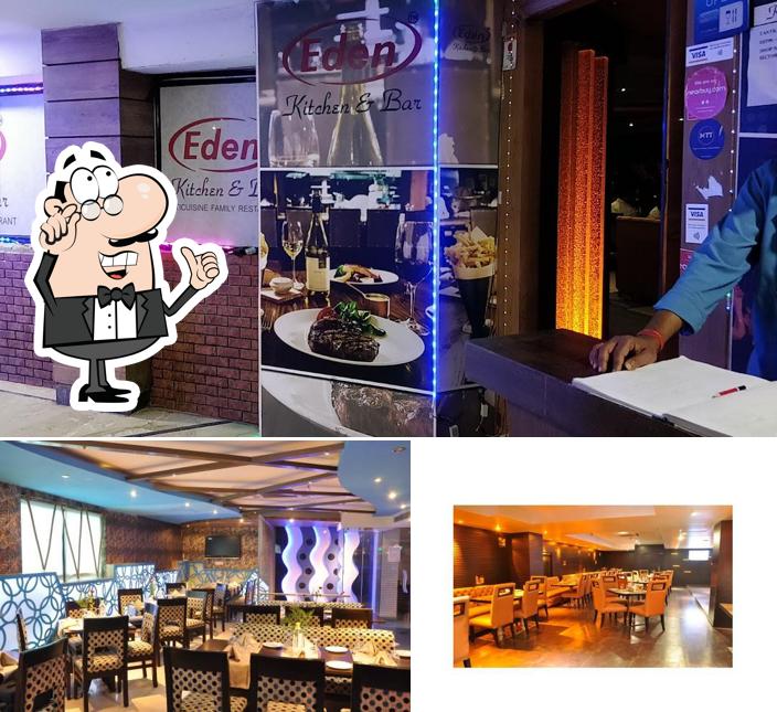 Take a seat at one of the tables at Eden Kitchen & Bar - Best bar and restaurant in noida
