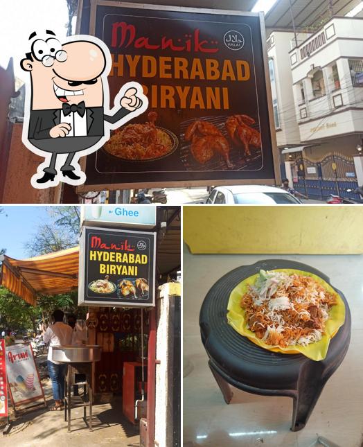 Check out the picture displaying interior and exterior at Manik Hyderabad Biriyani