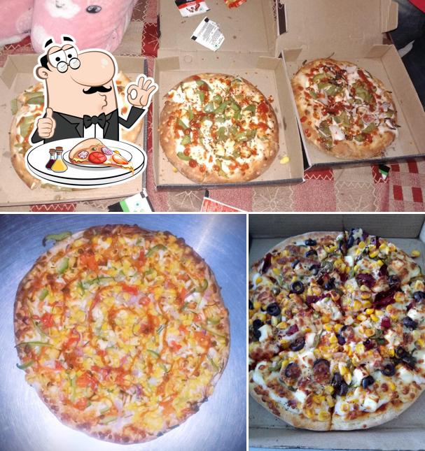 Get pizza at Pizza Cafeteria