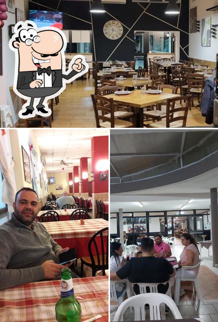 Dai un'occhiata agli interni di Pizza Village 2.0
