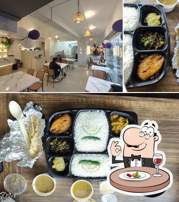 Take a look at the picture showing food and interior at The White Flame