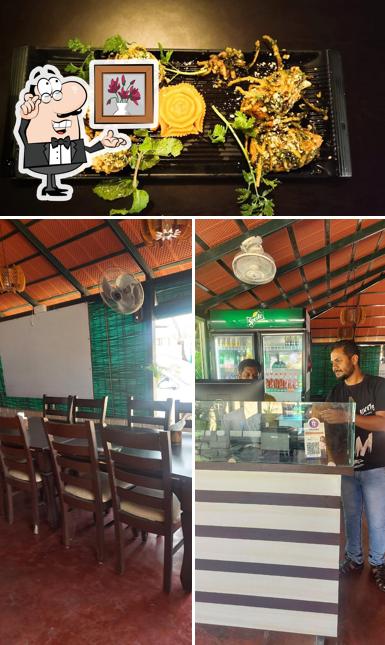 Check out the photo depicting interior and food at New Aroma Multi-Cuisine Restaurant