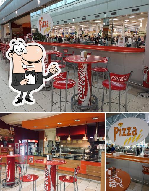 Gli interni di Pizza Mí