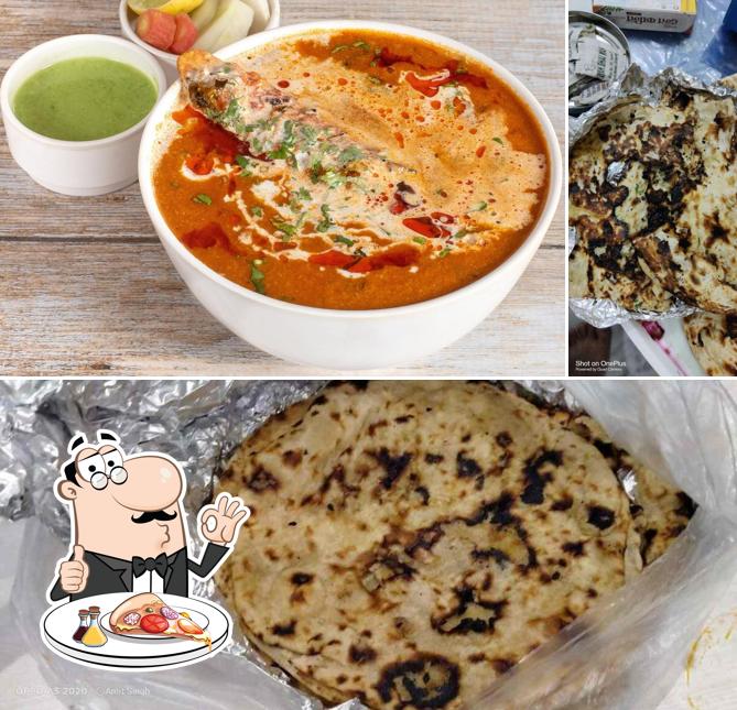Pick pizza at Ambika Family restaurant