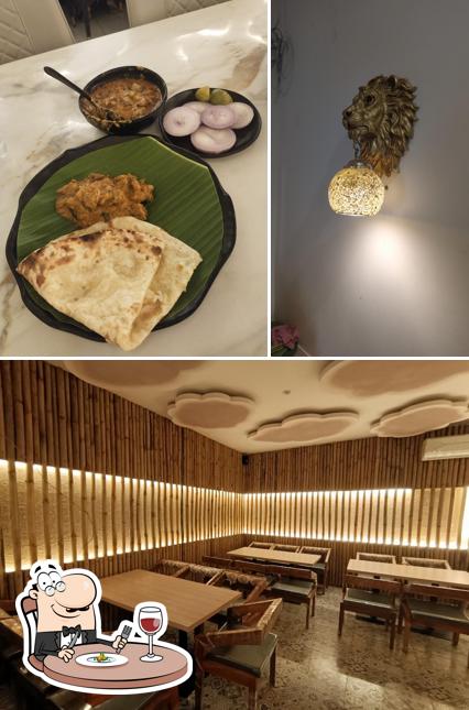 Check out the picture showing food and interior at SS FAMILY DHABA