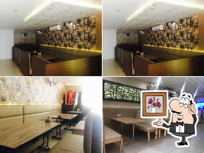 Take a seat at one of the tables at Chawla Chicken