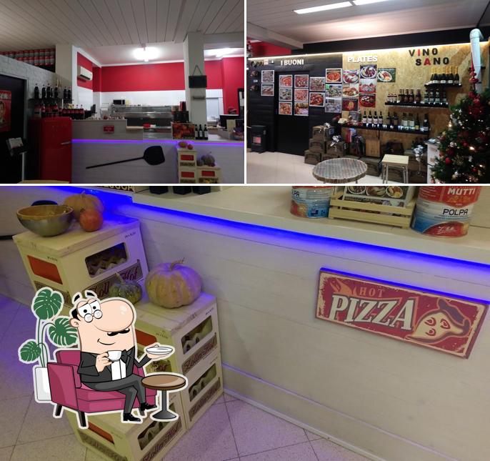Dai un'occhiata agli interni di Mordipizza