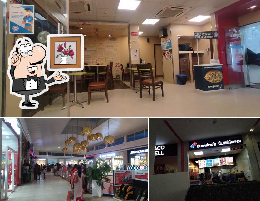 Take a seat at one of the tables at Domino's Pizza Prozone Mall, Coimbatore