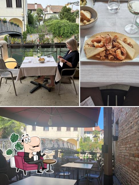 La foto di interni e bevanda da Alla Barchessa