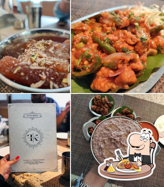Get pizza at Tilak's Kitchen