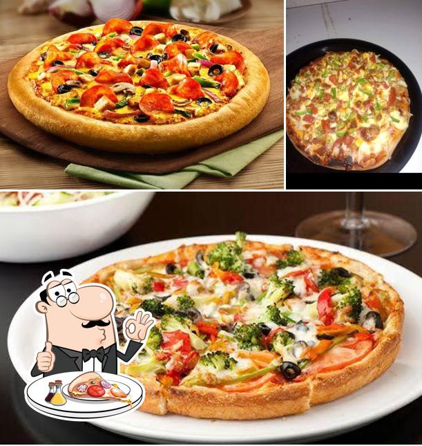 Try out pizza at IFC Restaurant Nlg