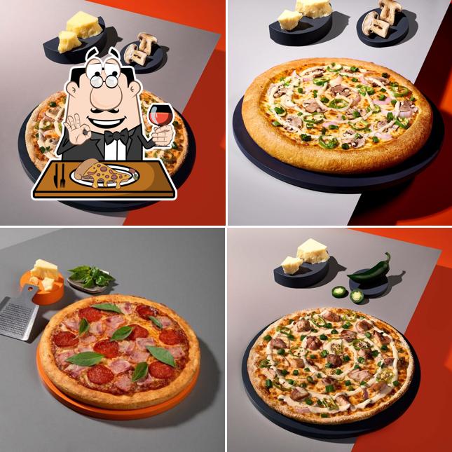 Get pizza at Tossin Pizza East Patel Nagar