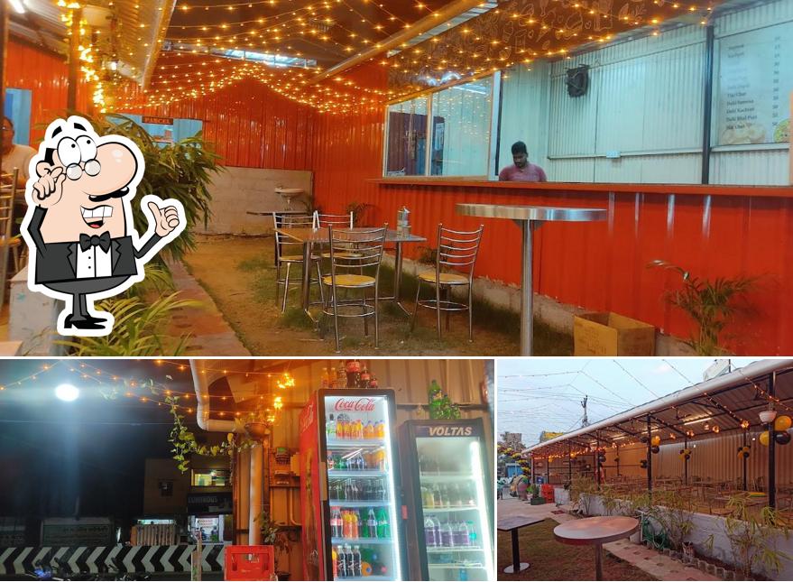 Take a seat at one of the tables at Sai Food court