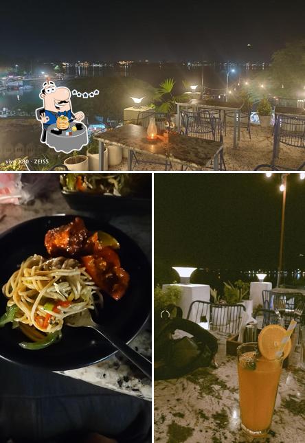 Among different things one can find food and interior at Seven Lakes Cafe and Restaurant-Best Lake View restaurant in Udaipursantorini vibes in udaipur Rooftop Cafe with Lake View