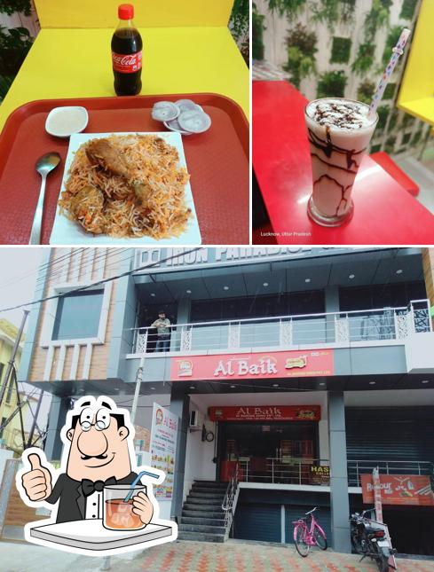 Take a look at the picture displaying drink and exterior at Albaik