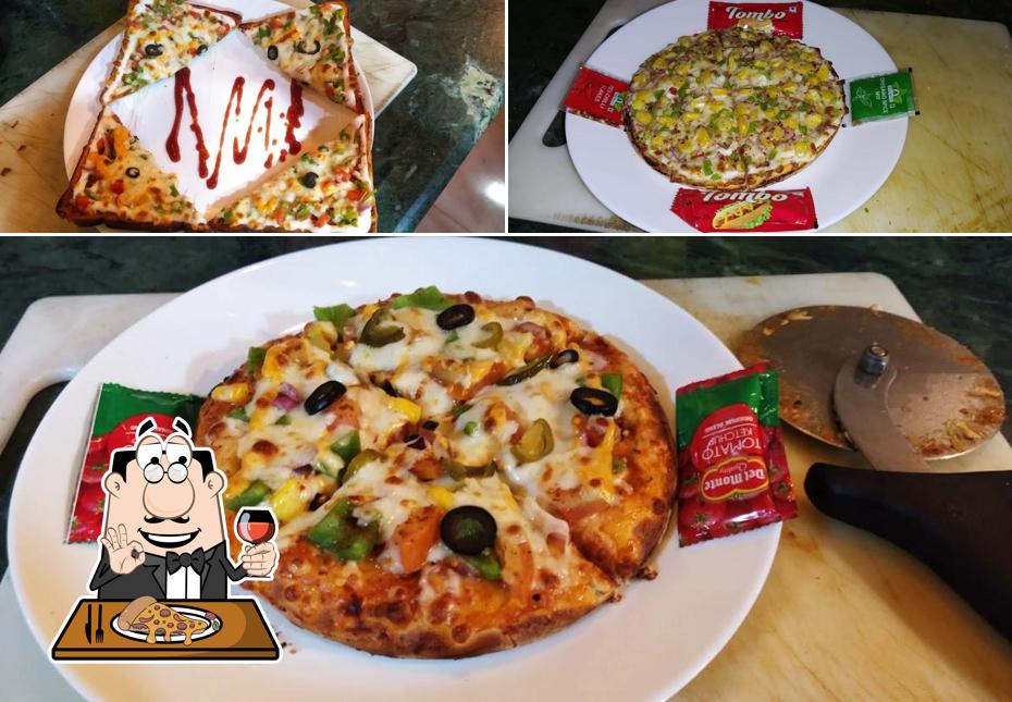 At Cafe Food Hub - Quick Bite, you can try pizza