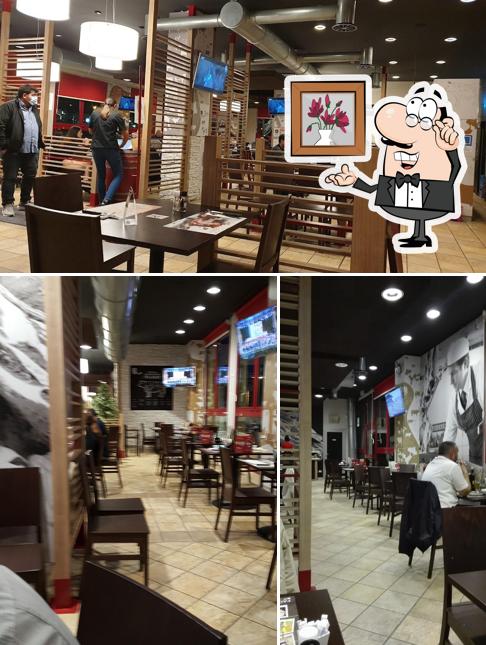 Dai un'occhiata agli interni di Roadhouse Restaurant Ferrara